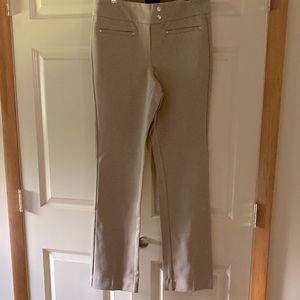 Pull on styling, slimming light front tummy control panel fitted thru thighs